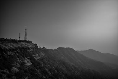 black and white picture of side of a small mountain/hill